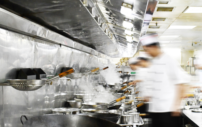 Chefs working in a busy kitchen