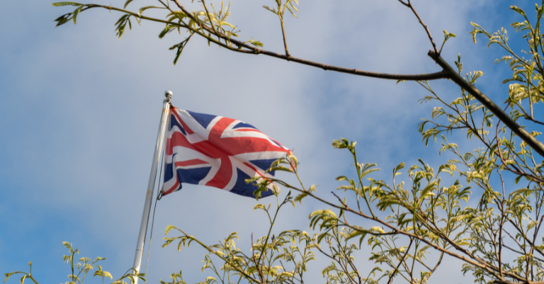 Photo: Union Flag flying against blue sky