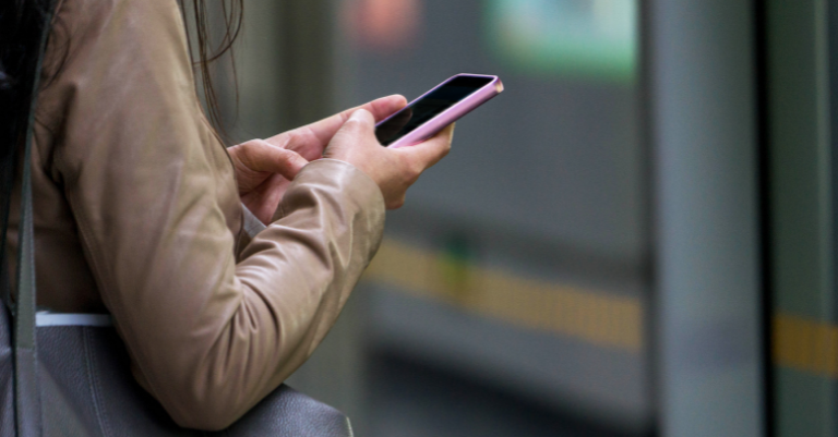 Mobile phone on the underground